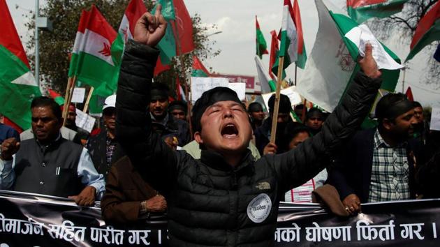 Activists take part in a rally to support ethnic Madhesis in Kathmandu. The Madhesis, who live in the plains, say the new constitution dilutes their political power and should be changed to accommodate their concerns.(Reuters file photo) Activists take part in a rally to support ethnic Madhesis in Kathmandu. The Madhesis, who live in the plains, say the new constitution dilutes their political power and should be changed to accommodate their concerns.(Reuters file photo)