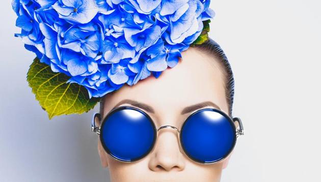 Fashion portrait of beautiful young lady with blue hydrangea (Getty Images/iStockphoto) Fashion portrait of beautiful young lady with blue hydrangea (Getty Images/iStockphoto)