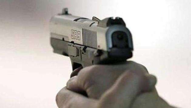 The business man died on the spot after being shot by the three bike-borne robbers. His wife, who also received a bullet injury, is critical while his son received superficial wound. (HT FILE) The business man died on the spot after being shot by the three bike-borne robbers. His wife, who also received a bullet injury, is critical while his son received superficial wound. (HT FILE)