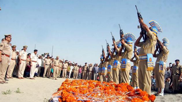CRPF personnel give gun salute to one of the martyrs of April 24 Sukma attack.(PTI File)