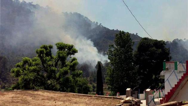 Shelling from Pakistan at a village along the Line of Control in Rajouri district in Jammu and Kashmir.(PTI) Shelling from Pakistan at a village along the Line of Control in Rajouri district in Jammu and Kashmir.(PTI)