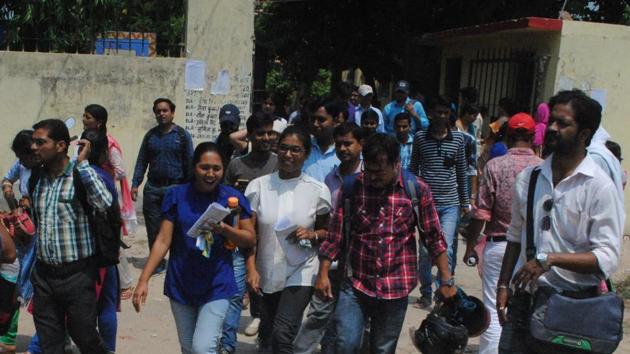CLAT aspirants coming out of an examination centre, in Patna on Sunday.(AP Dube/HT Photo)