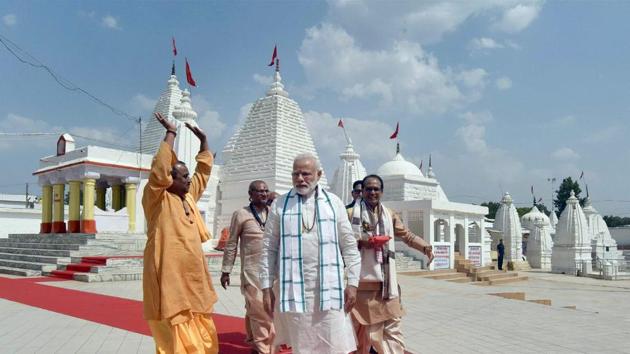 Prime Minister Narendra Modi with Madhya Pradesh chief minister Shivraj Singh Chouhan in Amarkantak, May 15 (PTI)