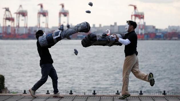 Members of Superhuman Sports Society demonstrate ‘Rock Hand Battle’ sport in Tokyo, Japan, April 13, 2017. Japan has a rich history spanning ancient legends and sport to popular comics and video games. Now a new generation of inventors is drawing on this culture to create sports with a 21st-century twist -- helping players feel ‘superhuman” through technology or other special equipment.