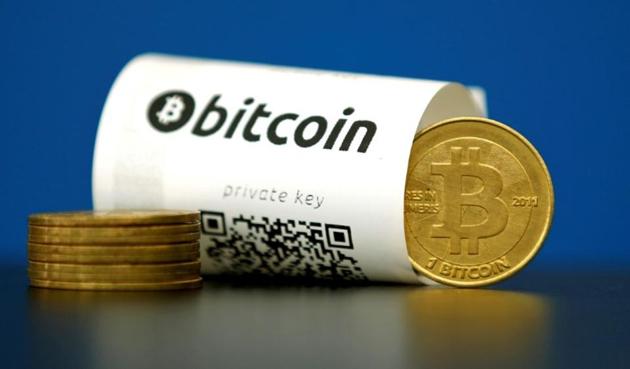 A Bitcoin (virtual currency) paper wallet with QR codes and a coin are seen in an illustration picture. (Reuters) A Bitcoin (virtual currency) paper wallet with QR codes and a coin are seen in an illustration picture. (Reuters)