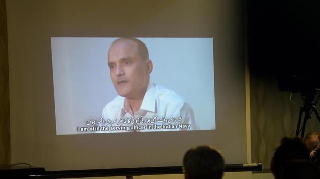 Journalists watch a video showing Indian national Kulbhushan Yadav during a press conference in Islamabad. (AFP File) Journalists watch a video showing Indian national Kulbhushan Yadav during a press conference in Islamabad. (AFP File)
