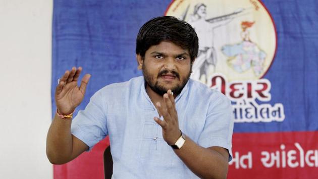 Patidar Anamat Andolan Samiti convener Hardik Patel address a press conference at his house in Ahmedabad on Wednesday. (PTI Photo) Patidar Anamat Andolan Samiti convener Hardik Patel address a press conference at his house in Ahmedabad on Wednesday. (PTI Photo)