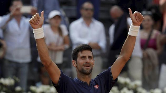 Novak Djokovic celebrates after beating Spain's Roberto Bautista Agut at the Italian Open tennis tournament in Rome on Thursday. Djokovic will take on the winner of the match between Juan Martin del Potro and Kei Nishikori (AP) Novak Djokovic celebrates after beating Spain's Roberto Bautista Agut at the Italian Open tennis tournament in Rome on Thursday. Djokovic will take on the winner of the match between Juan Martin del Potro and Kei Nishikori (AP)