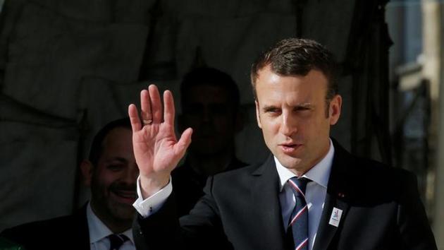 French President Emmanuel Macron wears a Paris 2024 pin and waves goodbye after a meeting with the International Olympic Committee (IOC) Evaluation Commission at the Elysee Place in Paris on May 16. (Reuters) French President Emmanuel Macron wears a Paris 2024 pin and waves goodbye after a meeting with the International Olympic Committee (IOC) Evaluation Commission at the Elysee Place in Paris on May 16. (Reuters)