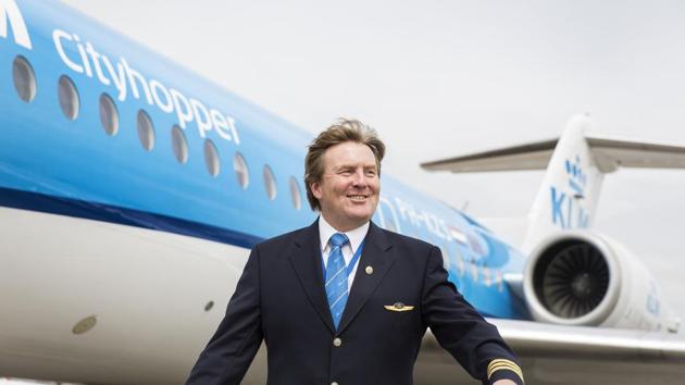 Dutch King Willem-Alexander posing in front of a KLM Cityhopper aircraft at Schiphol Airport, near Amsterdam. (AFP Photo) Dutch King Willem-Alexander posing in front of a KLM Cityhopper aircraft at Schiphol Airport, near Amsterdam. (AFP Photo)
