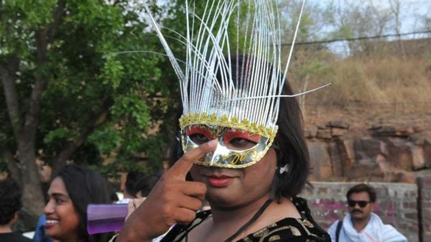 A LGBT community member participates in the queer pride parade. (Mujeeb Faruqui/HT Photo) 
