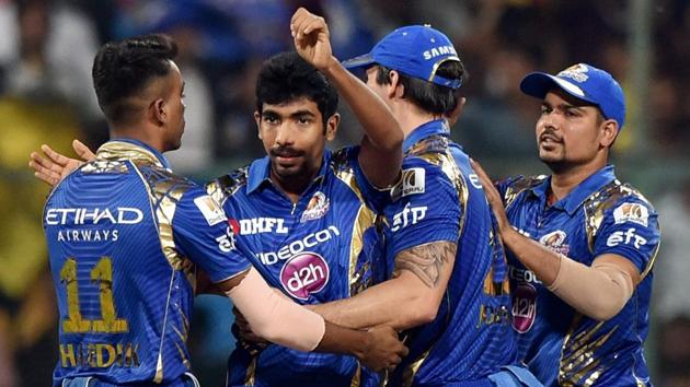 Mumbai Indians (MI) pacer Jasprit Bumrah (2nd left) and leggie Karn Sharma (right) took seven Kolkata Knight Riders (KKR) wickets between them to help push the Rohit Sharma-led side into the Indian Premier League final on Friday. (PTI) Mumbai Indians (MI) pacer Jasprit Bumrah (2nd left) and leggie Karn Sharma (right) took seven Kolkata Knight Riders (KKR) wickets between them to help push the Rohit Sharma-led side into the Indian Premier League final on Friday. (PTI)
