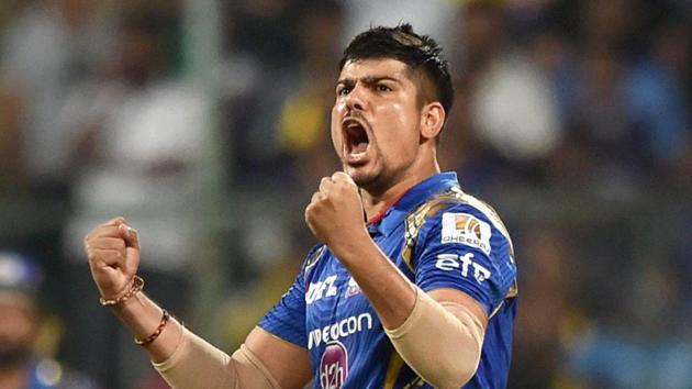 Karn Sharma of Mumbai Indians (MI) celebrates the wicket of Sunil Narine of Kolkata Knight Riders (KKR) during their Indian Premier League (IPL) qualifier 2 match at M Chinnaswamy Stadium in Bengaluru on Friday.(PTI)