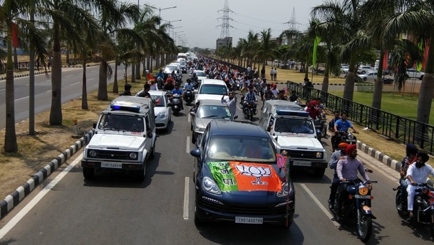 BJP national president Amit Shah during his roadshow in Chandigarh on Saturday. (Raci Kumar/HT Photo) BJP national president Amit Shah during his roadshow in Chandigarh on Saturday. (Raci Kumar/HT Photo)