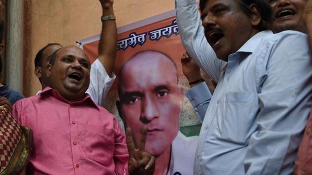 People react after Kulbhushan Jadhav’s execution was stayed by the International Court of Justice. (AFP Photo) People react after Kulbhushan Jadhav’s execution was stayed by the International Court of Justice. (AFP Photo)