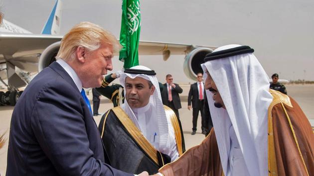 US President Donald Trump (L) shakes hands with Saudi King Salman bin Abdulaziz al-Saud (R) upon arrival at King Khalid International Airport in Riyadh on May 20, 2017.(AFP Photo) US President Donald Trump (L) shakes hands with Saudi King Salman bin Abdulaziz al-Saud (R) upon arrival at King Khalid International Airport in Riyadh on May 20, 2017.(AFP Photo)