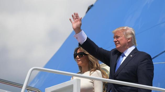US President Donald Trump and First Lady Melania Trump make their way to board Air Force One before departing from Andrews Air Force Base in Maryland on May 19. (AFP Photo) US President Donald Trump and First Lady Melania Trump make their way to board Air Force One before departing from Andrews Air Force Base in Maryland on May 19. (AFP Photo)