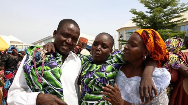 One of the Newly released 82 Chibok school girls embraces her parents as she reunites with her family in Abuja, Nigeria. (Afolabi Sotunde / REUTERS) One of the Newly released 82 Chibok school girls embraces her parents as she reunites with her family in Abuja, Nigeria. (Afolabi Sotunde / REUTERS)