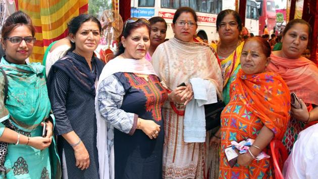 Anganwadi workers and helpers, who were asked to attend the programme of health minister at International Public School in Ludhiana on Saturday. (Jagtinder Singh Grewal/HT Photo) Anganwadi workers and helpers, who were asked to attend the programme of health minister at International Public School in Ludhiana on Saturday. (Jagtinder Singh Grewal/HT Photo)