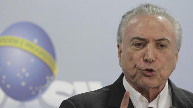 Brazil's President Michel Temer speaks during a national address from the Planalto Presidential Palace in Brasilia on Saturday. (AP Photo) Brazil's President Michel Temer speaks during a national address from the Planalto Presidential Palace in Brasilia on Saturday. (AP Photo)