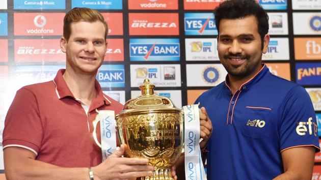 Mumbai Indians skipper Rohit Sharma (R) and Rising Pune Supergiant captain Steve Smith (L) pose with the IPL 2017 trophy on the eve of the final in Hyderabad. (PTI) Mumbai Indians skipper Rohit Sharma (R) and Rising Pune Supergiant captain Steve Smith (L) pose with the IPL 2017 trophy on the eve of the final in Hyderabad. (PTI)