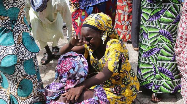 This handout picture released on May 20, 2017 by PGDBA & HND Mass Communication shows family members crying while being reunited with the released Chibok girls in Abuja on May 20, 2017. Boko Haram kidnapped 276 students from the Government Girls Secondary School in the remote town in Borno state on the evening of April 14, 2014. Fifty-seven escaped in the hours that followed but 219 were not so lucky. Since then, 106 girls have been found, rescued or released, including 82 who were freed earlier this month in a prisoner swap deal for a number of Boko Haram suspects in custody. (AFP) This handout picture released on May 20, 2017 by PGDBA & HND Mass Communication shows family members crying while being reunited with the released Chibok girls in Abuja on May 20, 2017. Boko Haram kidnapped 276 students from the Government Girls Secondary School in the remote town in Borno state on the evening of April 14, 2014. Fifty-seven escaped in the hours that followed but 219 were not so lucky. Since then, 106 girls have been found, rescued or released, including 82 who were freed earlier this month in a prisoner swap deal for a number of Boko Haram suspects in custody. (AFP)