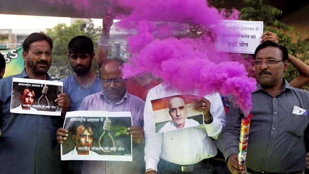 People celebrate with crackers the ICJ verdict on Kulbhushan Jadhav in Ahmedabad on Thursday. (PTI) People celebrate with crackers the ICJ verdict on Kulbhushan Jadhav in Ahmedabad on Thursday. (PTI)