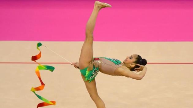 Portugal's Laura Sales performs with ribbon during the 33rd Rhythmic Gymnastics European championships in Budapest, Hungary. (ATTILA KISBENEDEK / AFP)