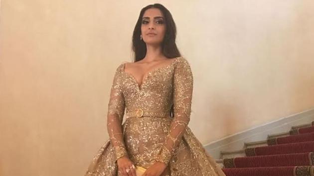For her second red carpet appearance, Sonam Kapoor wore a gold-coloured Eli Saab dress. For her second red carpet appearance, Sonam Kapoor wore a gold-coloured Eli Saab dress.