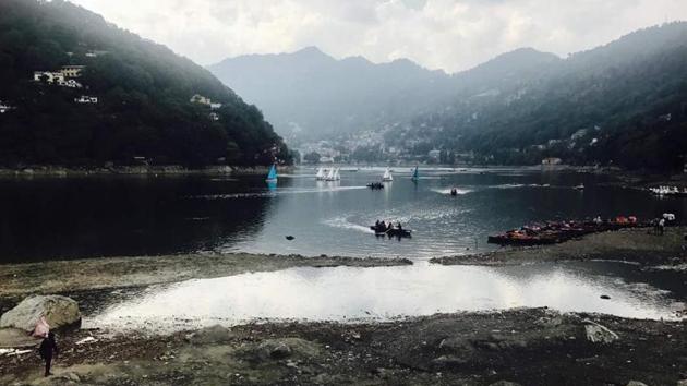 The Nainital Lake has touched an abysmal level of 14 feet below normal this season, a clear indication of impending ecological disaster. According to the Centre’s draft State of the Environment report, 2015, loss to the Indian economy from water resource depletion is pegged at 6% by 2050 if the country continues to manage its water the same way(HT Photo)