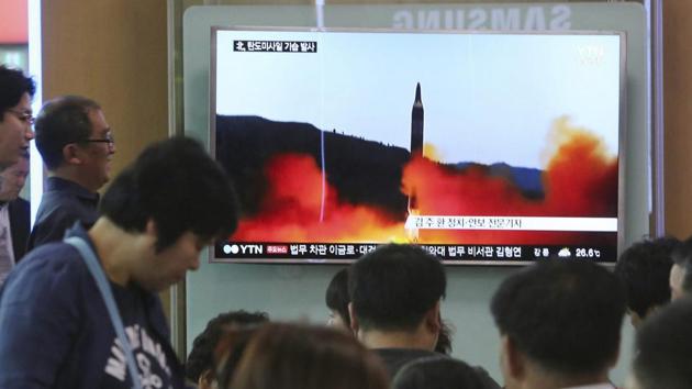 People watch a TV news program showing a file image of a missile launch by North Korea at the Seoul Railway Station in South Korea on Sunday. (AP Photo) People watch a TV news program showing a file image of a missile launch by North Korea at the Seoul Railway Station in South Korea on Sunday. (AP Photo)