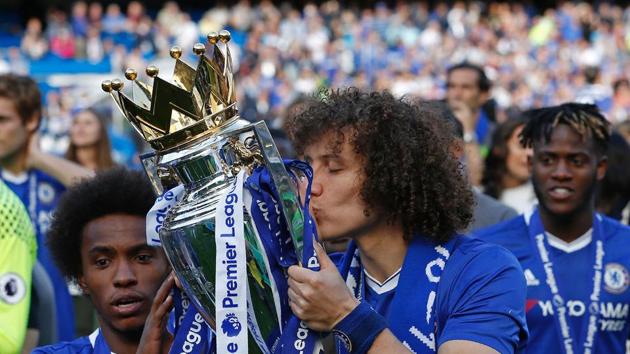 Chelsea's Brazilian defender David Luiz kisses the Premier League trophy during the presentation. (AFP) Chelsea's Brazilian defender David Luiz kisses the Premier League trophy during the presentation. (AFP)