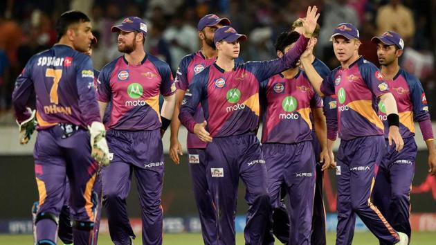 Rising Pune Supergiant skipper Steve Smith with team mates celebrate the wicket of Ambati Rayudu. (PTI)
