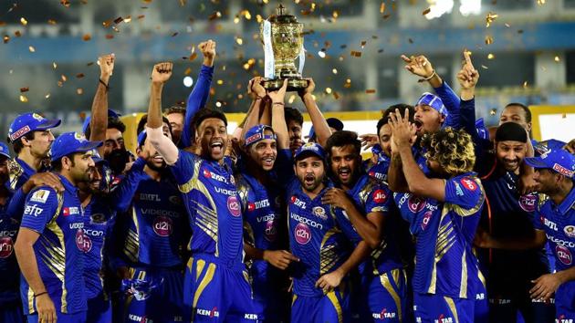 Mumbai Indians players with the IPL 2017 trophy after they defeated Rising Pune Supergiants by 1 run in the final. (PTI)