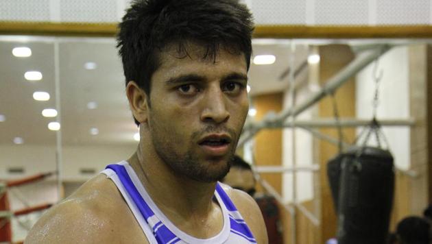Sumit was all of 11 when picked up gloves at his uncle’s training academy in a Karnal village.(HT File Photo)