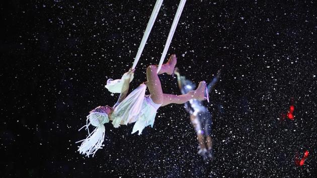 Trapeze artists perform on the final day. (Bruce Bennett / AFP)
