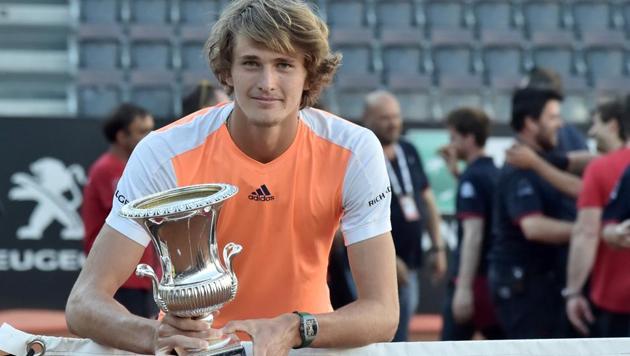 Alexander Zverev of Germany poses with the Italian Open trophy after beating Novak Djokovic on May 21 at the Foro Italico in Rome. (AFP) Alexander Zverev of Germany poses with the Italian Open trophy after beating Novak Djokovic on May 21 at the Foro Italico in Rome. (AFP)