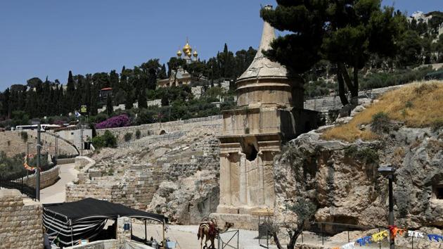 AFTER: : Avshalom's tomb and the Garden of Gethsemane are seen in Jerusalem . Both stand on an elevated plaza Jews refer to as Temple Mount, the holiest site in Judaism, and the location of an ancient Jewish temple. (Ronen Zvulun / REUTERS)