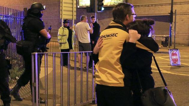 Armed police stand guard at Manchester Arena after reports of an explosion at the venue during an Ariana Grande gig in Manchester, England. (AP Photo) Armed police stand guard at Manchester Arena after reports of an explosion at the venue during an Ariana Grande gig in Manchester, England. (AP Photo)