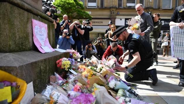Floral tributes offered in St Ann's Square in Manchester as a mark of respect to those killed and injured following a deadly terror attack at the Manchester Arena. (AFP) Floral tributes offered in St Ann's Square in Manchester as a mark of respect to those killed and injured following a deadly terror attack at the Manchester Arena. (AFP)