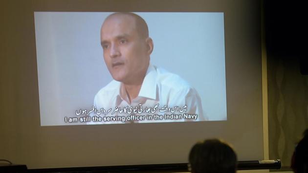 This file photo shows Pakistani journalists watching a video showing Indian national Kulbhushan Yadav, arrested on suspicion of spying, during a press conference in Islamabad. (AFP File Photo) This file photo shows Pakistani journalists watching a video showing Indian national Kulbhushan Yadav, arrested on suspicion of spying, during a press conference in Islamabad. (AFP File Photo)