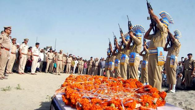 CRPF personnel give the gun salute to a trooper killed in the Sukma attack. (PTI) CRPF personnel give the gun salute to a trooper killed in the Sukma attack. (PTI)