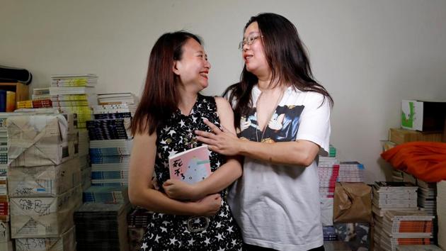 Hare Lin (L), a publisher, and Cho Chia-lin, 47, a writer, pose for a photograph in Taiwan. The constitutional court said if parliament does not make the change within two years, same-sex couples could register to marry regardless, based on its interpretation. (Tyrone Siu/REUTERS ) Hare Lin (L), a publisher, and Cho Chia-lin, 47, a writer, pose for a photograph in Taiwan. The constitutional court said if parliament does not make the change within two years, same-sex couples could register to marry regardless, based on its interpretation. (Tyrone Siu/REUTERS )