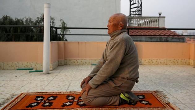 In this file photo from April 2017, Nepali mountaineer Min Bahadur Sherchan, 85, performs yoga in Kathmandu. Serchan died at base camp in early May while attempting to climb Everest to try and retain his earlier title of the oldest person to conquer the world's highest mountain. (REUTERS)