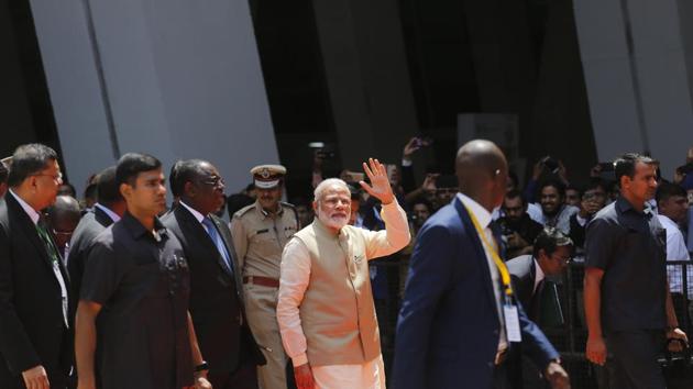 Indian Prime Minister Narendra Modi, waves to people as he leaves after inaugurating the annual meeting of the African Development Bank in Gandhinagar, India, Tuesday, May 23, 2017. (AP Photo) Indian Prime Minister Narendra Modi, waves to people as he leaves after inaugurating the annual meeting of the African Development Bank in Gandhinagar, India, Tuesday, May 23, 2017. (AP Photo)