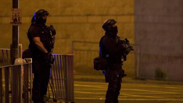 Armed police officers stand outside the Manchester Arena, where US singer Ariana Grande had been performing in Manchester, northern England, Britain. (Reuters) Armed police officers stand outside the Manchester Arena, where US singer Ariana Grande had been performing in Manchester, northern England, Britain. (Reuters)