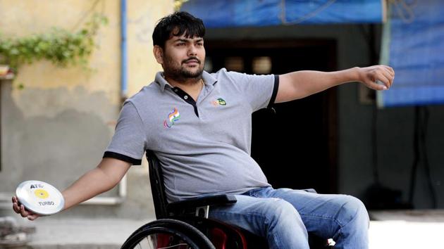 An accident while diving left him paralysed from waist down. Dharamvir Nain was about to get into depression when a chance meeting with a senior para-athlete had him turning to club and discus throw. (HT Photo) An accident while diving left him paralysed from waist down. Dharamvir Nain was about to get into depression when a chance meeting with a senior para-athlete had him turning to club and discus throw. (HT Photo)