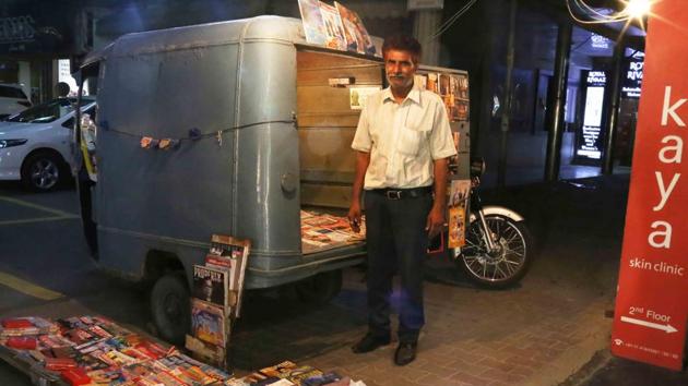 “The business has dropped by more than half in the last 10 years,” says Harishchandra Singh, who sells magazines in South Extension II.(Mayank Austen Soofi)