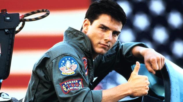 Cruise played the cocky pilot Maverick in Top Gun, one of the top students in an U.S. training camp for elite military fighter pilots and engaged in a bitter rivalry with a fellow pilot played by Val Kilmer. Cruise played the cocky pilot Maverick in Top Gun, one of the top students in an U.S. training camp for elite military fighter pilots and engaged in a bitter rivalry with a fellow pilot played by Val Kilmer.