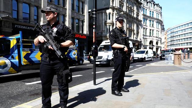 Armed police officers stand on duty outside St Paul's Cathedral in London on May 24, 2017.(Reuters)